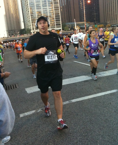Paul running a marathon in downtown Chicago