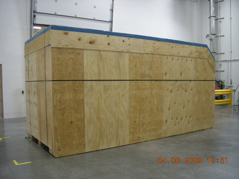 Large wooden box in a warehouse